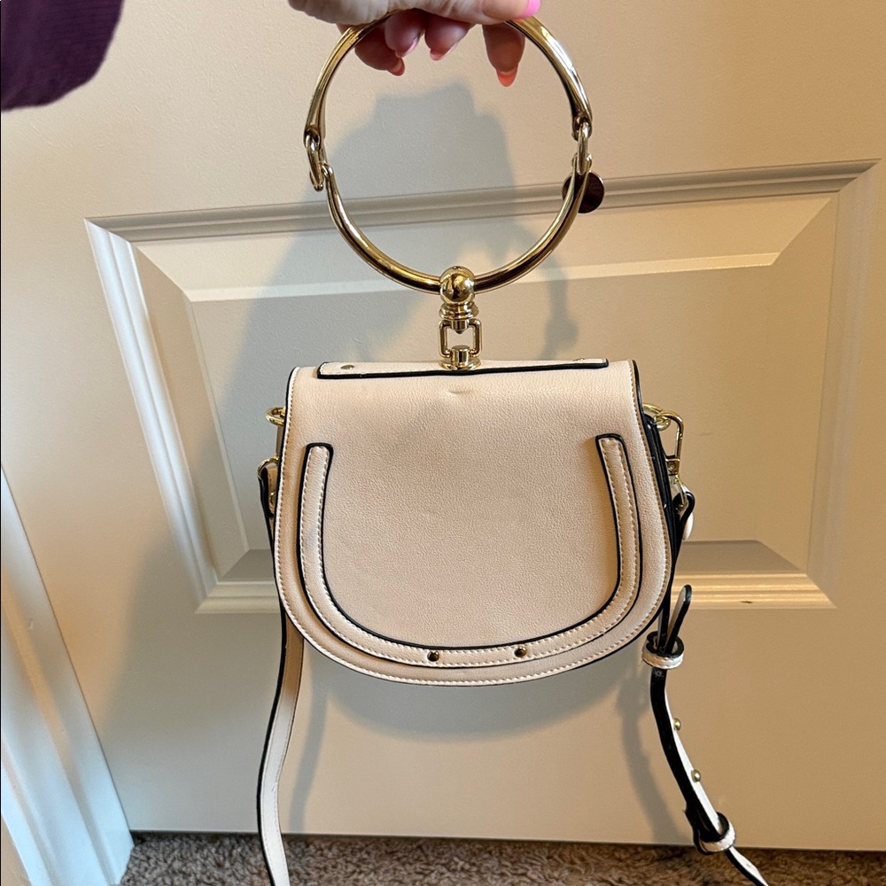 Elegant Cream Handbag with Gold Accents